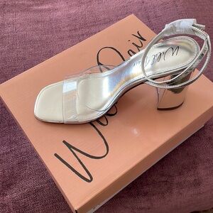 New in the box wild pair glass slippers